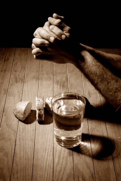 istock Jesus Christ struck and bleeding with crown 1301096099