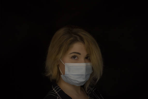 istock Girl in mask 1301099529