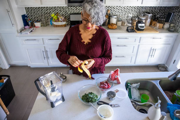 istock Beautiful Black Woman Having a Smoothie 1301101212