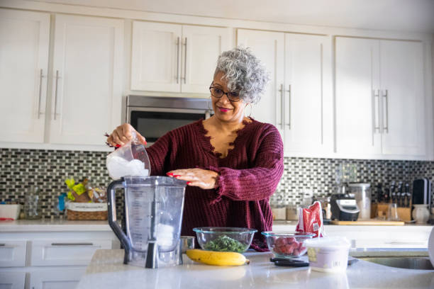 istock Beautiful Black Woman Having a Smoothie 1301101790