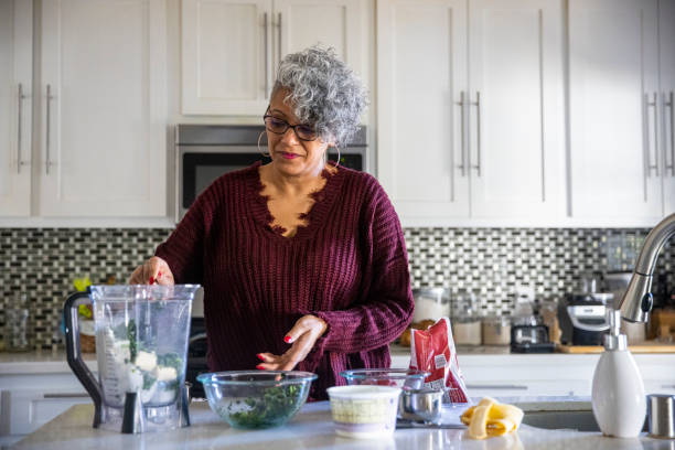 istock Beautiful Black Woman Having a Smoothie 1301101919