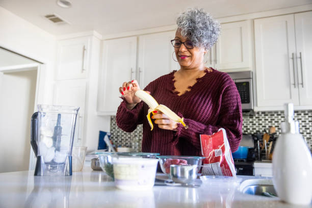 istock Beautiful Black Woman Having a Smoothie 1301101988