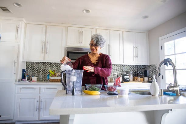istock Beautiful Black Woman Having a Smoothie 1301102014