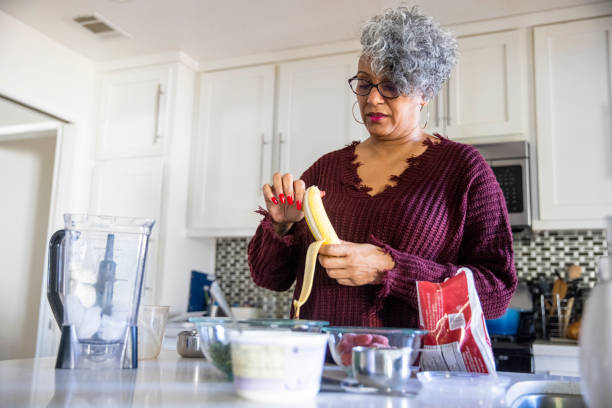 istock Beautiful Black Woman Having a Smoothie 1301102028