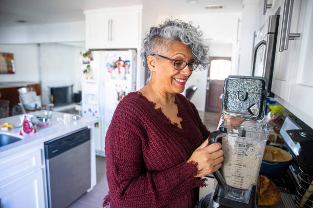 istock Beautiful Black Woman Having a Smoothie 1301102035