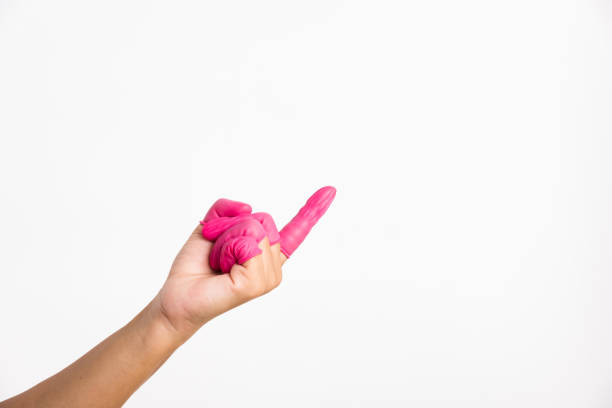 istock Woman hand wearing pink finger cots rubber 1301102254