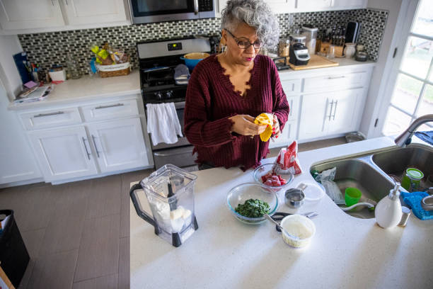 istock Beautiful Black Woman Having a Smoothie 1301102308