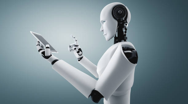 istock Robot humanoid use mobile phone or tablet in future office 1301105986