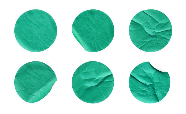 istock Blank green round adhesive paper sticker label set collection isolated on white background 1301107329