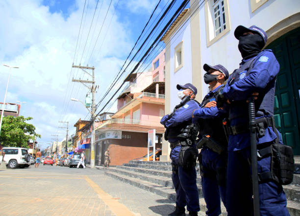 salvador municipal guard salvador, bahia, brazil - february 4, 2021: agents of the Municipal Guard are seen during a police operation in the Itapua neighborhood in the city of Salvador. tear gas photos stock pictures, royalty-free photos & images