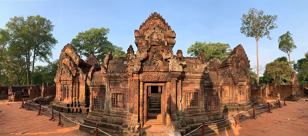 Banteay Srei, Cambodia - January 24, 2020: Banteay Srei is a 10th-century Cambodian temple dedicated to the Hindu god Shiva. It is built largely of red sandstone that can be carved like wood and millions of visitors admire the intricate reliefs carved in red colored sandstone.