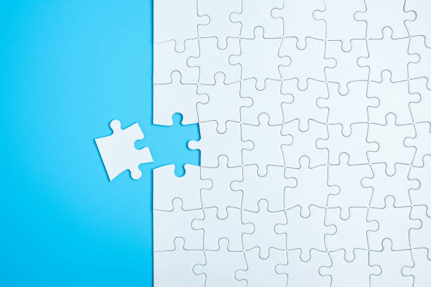 istock Last piece of white puzzle to complete a mission 1301111301