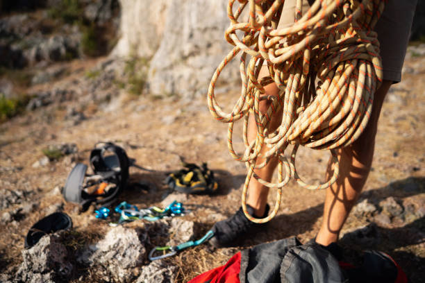 istock Close-up of an unrecognizable man holding climbing rope 1301112006