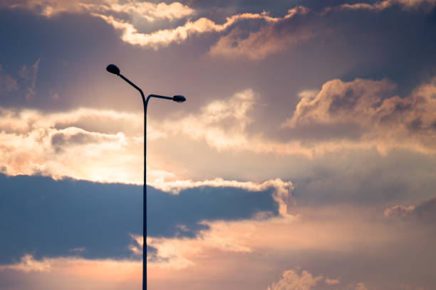 Street lamp on evening blue sky and clouds background and copy space