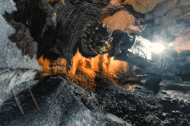 Drilling head of a mine roadheader. Underground mining of ore deposits.