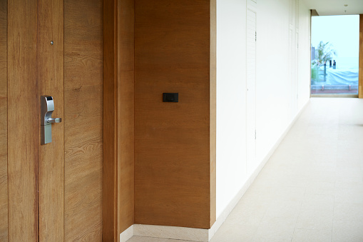 Hotel door and balcony with ring button
