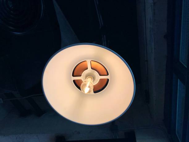 istock top view vintage round light bulb at dining room ceiling 1301115218