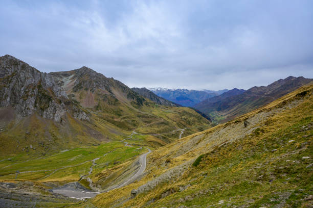 istock ZIgzag road through a valley with Pyrenee mountain range, France 1301117669