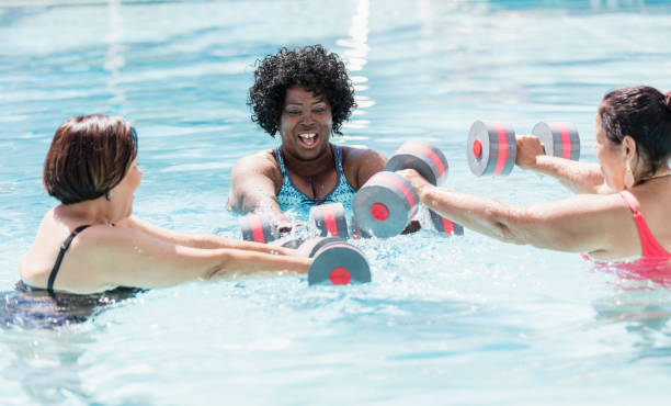 istock Three senior women doing water aerobics 1301118683