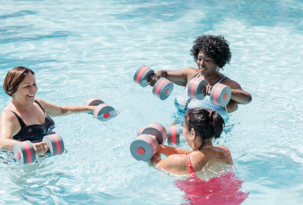 istock Three senior women doing water aerobics 1301118684