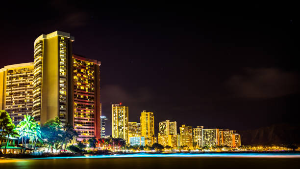 istock Waikiki beach cityscape at night 1301119668
