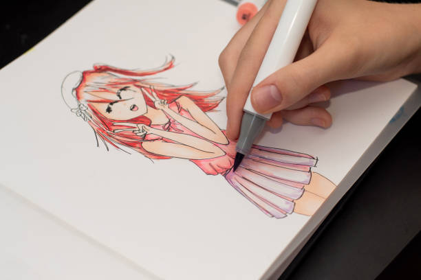 Alcohol based sketch drawing markers. Brush and chisel double ended for illustrators and graphic designers. Hand drawing a cute girl anime style sketch with alcohol based sketch drawing markers. paper based equipment stock pictures, royalty-free photos & images