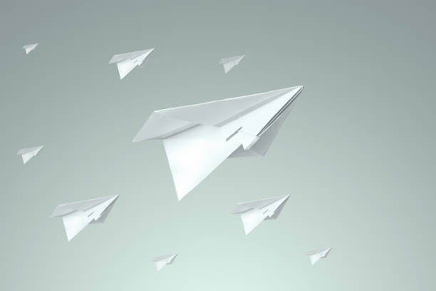 istock Lots of white paper samaletik on a light background. Startup concept, light business, getting started. Copy space. 1301122711