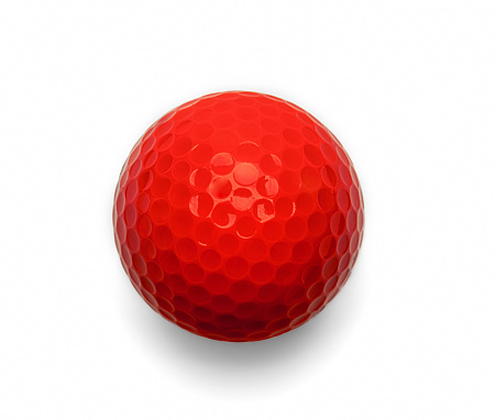 orange golf ball on white background