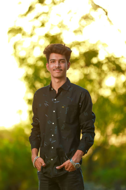 istock Young handsome indian man wearing black shirt 1301127212