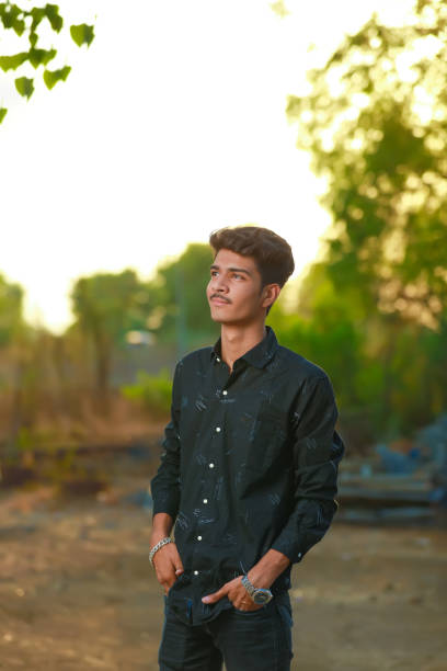 istock Young handsome indian man wearing black shirt 1301127235