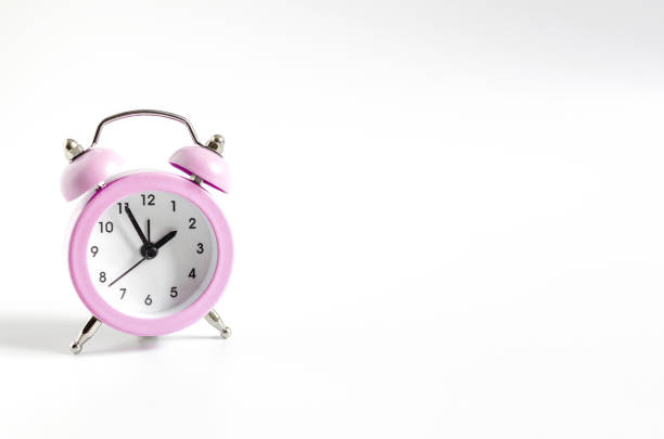 istock classic mechanical clock alarm clock on a light background close up copy space 1301127515