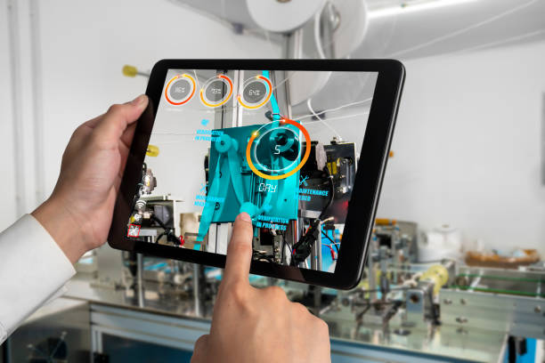 tekniker använder augmented reality-programvara i smart fabriksproduktionslinje - augmented reality bildbanksfoton och bilder