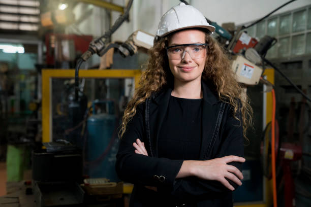 istock Manufacturing worker. Caucasian worker controlling the work. Cheerful Factory Worker Posing. 1301128223