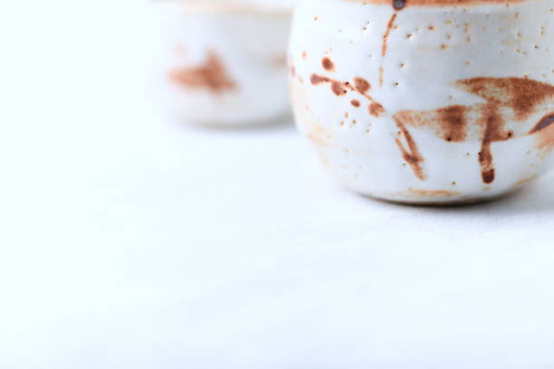 istock Traditional, handcrafted ceramic on bright wooden background. Soft focus. Close up. 1301129706