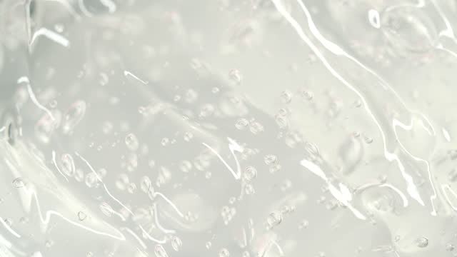 Close-up transparent serum gel texture