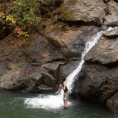 Teenager diving into water in Costa Rica