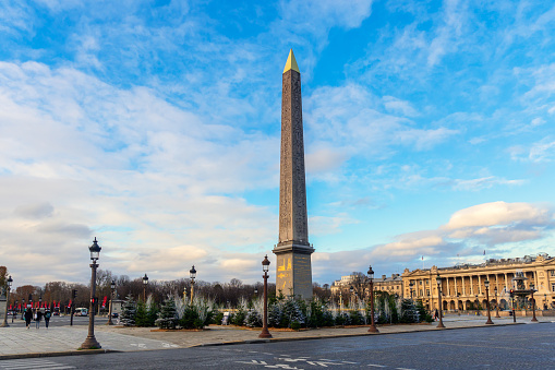 Christmas trees at the bottom of the Obelisk monument at Place de la concorde in December 2020 - Paris, France