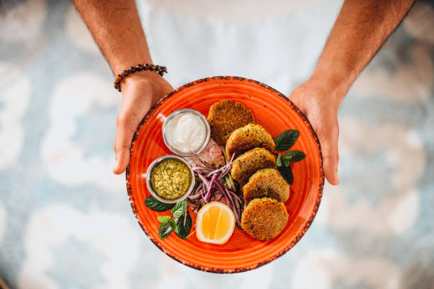 Chickpea falafel balls served with hummus and olive oil