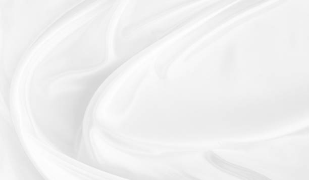 istock White gray satin texture that is white silver fabric silk background with beautiful soft blur pattern natural. 1301136063