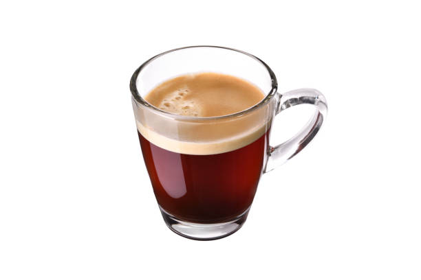istock Glass cup of espresso coffee isolated on white background 1301137154