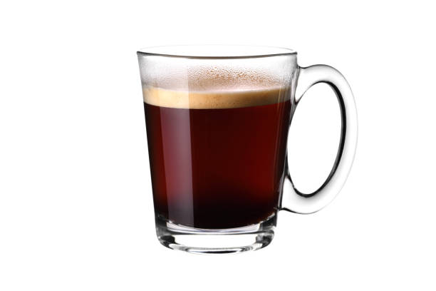 istock Glass cup of espresso coffee isolated on white background 1301137155