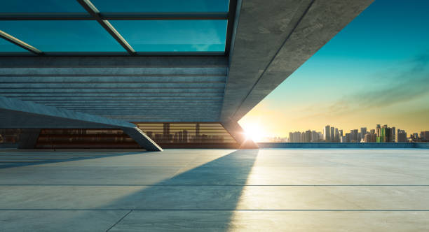 istock Concrete floor and modern rooftop building 1301138153