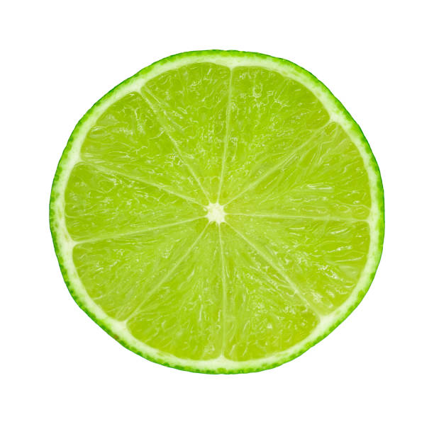 istock Juicy slice of lime isolated on white background, top view 1301139267