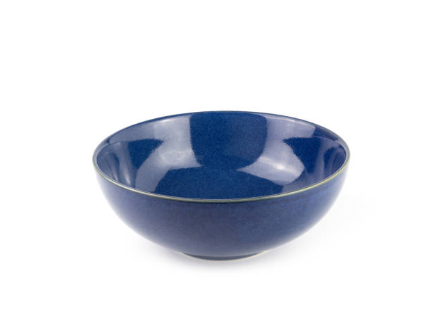 istock Front view empty blue ceramic bowl isolated on a white background. Use for home or restaurant, food design. Kitchen accessory. 1301139940