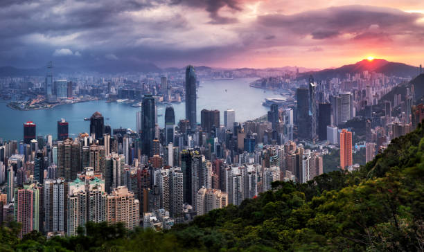 istock Hong Kong skyline at dramatic sunrise, Victoria harbour 1301140332