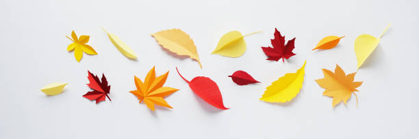 istock Leaves of paper fall red, orange, yellow leaf fall. 1301141212