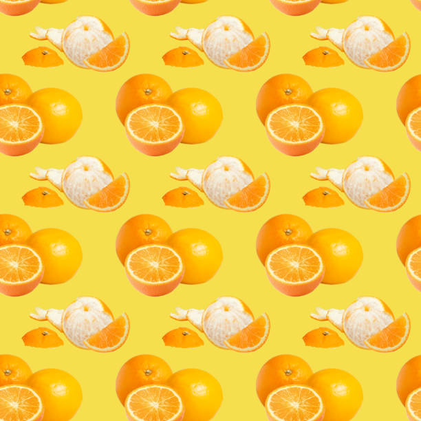 istock Oranges and tangerines on a yellow background. Seamless pattern. 1301144723