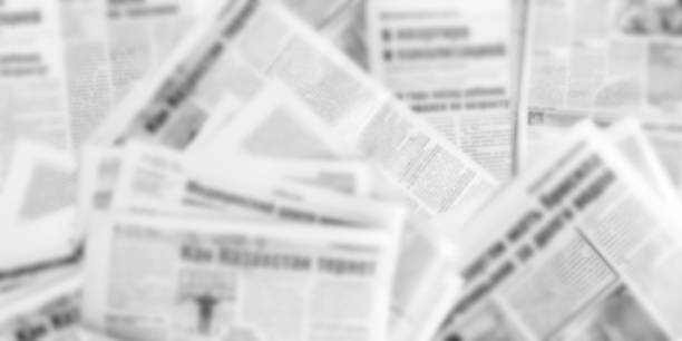 abstract blurred image of old newspapers. media news concept. panoramic image. - newspaper the media paper blank imagens e fotografias de stock