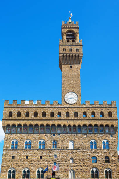 istock Palazzo Vecchio with the clock tower in Florence 1301144804