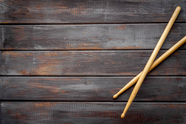 istock Top view of drum sticks with space for text. Music background 1301145041